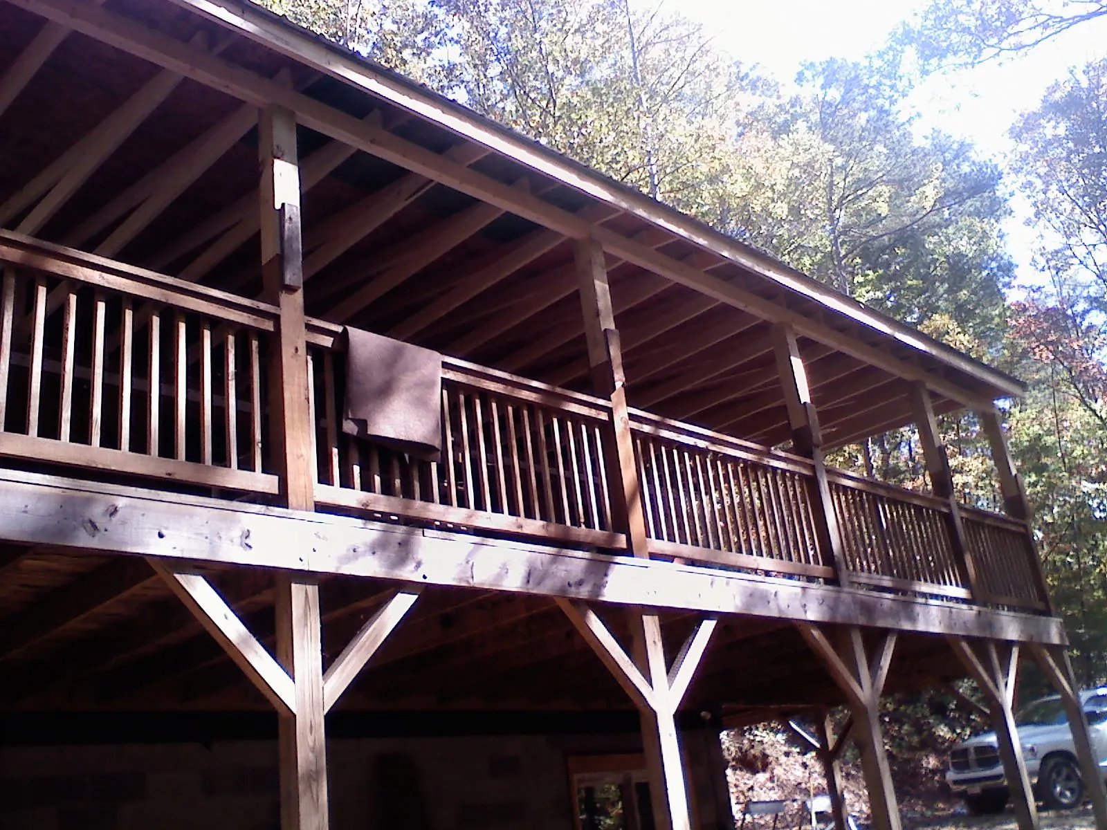 Timber framing under a new elevated porch and deck — Roof Leak Repair in Hyannis Port by Roofing Brothers